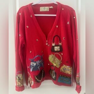 Design Options by Philip & Jane
Gordon Handbag
Applique Red Sweater Size
Medium